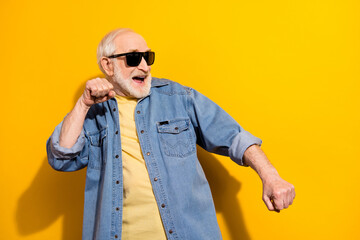 Portrait of carefree satisfied person toothy smile chilling partying vacation isolated on yellow...