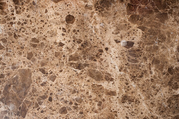 Brown and beige granite texture. Polished natural granite slab.