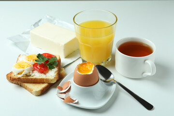 Concept of tasty breakfast with boiled egg, close up