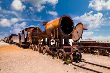 Old rusty locomotive abandoned in the train cemetery of Uyuni, Bolivia