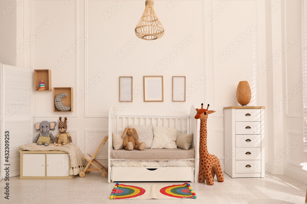 Sticker Cozy baby room interior with crib and toys