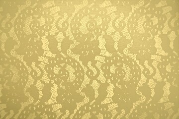 Gold lace pattern and tulle (yellow pastel) design. Elegant mesh pattern, lacey floral texture with copy space, and backdrop template.  Design element for paper, invitation, packaging, etc.