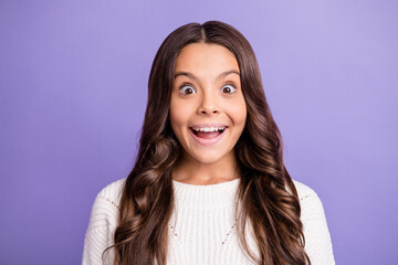 Obraz premium Portrait of young happy shocked amazed surprised smiling excited girl staring in camera isolated on purple color background