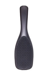 Closeup of a stylish new black hair brush isolated on white background. Concept of body and beauty care. Macro.