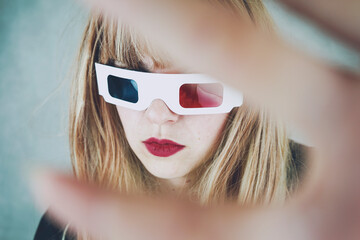 Young woman wearing vintage 3D glasses