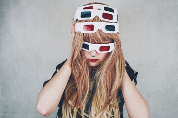 Young woman wearing vintage 3D glasses