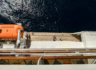 View over side hull superstructure of legendary ocean liner QM2 Queen Mary 2 cruiseship or cruise...
