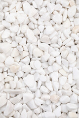 Fototapeta na wymiar Beautiful white stones as background, top view