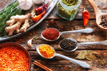 spices and herbs on wooden background