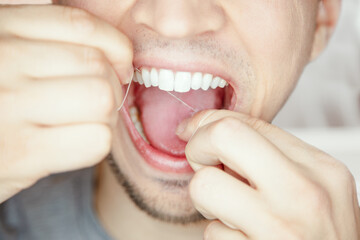 proper floos of your teeth and gum cleans and dislodges food stuck between your teeth, which...