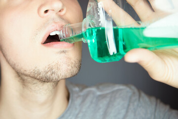 clean mouth with fluid mouthwash to prevent bad smell and get fresh breath as part of medical...