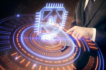 Double exposure of man's hand holding and using a digital device and data theme hologram drawing. Technology concept.
