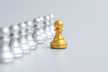 golden chess pawn pieces or leader businessman stand out of crowd people of silver men. leadership,...