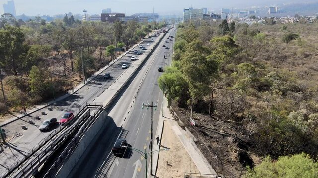 Big avenue, between a natural ecosistem in Mexico City
