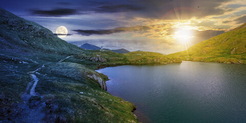 day and night time change concept above summer landscape with lake on high altitude. beautiful...