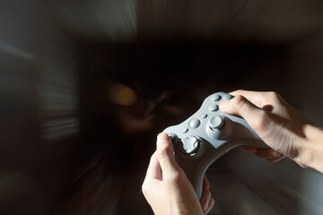 gamer playing game by joystick with computer, gaming and esports challenge tournament concept © issaronow