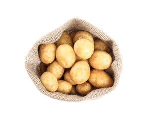 Raw fresh potatoes in sack bag isolated on white, top view