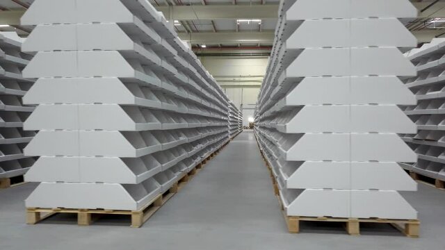 empty shelves due to supply in a logistics center