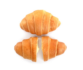 Delicious croissants with cream on white background, top view