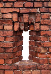 Hole in the brick wall with copy space.