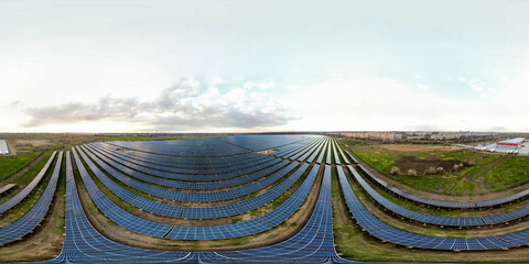 360 degree panorama of the solar station. solar power plant with city, buildings on background....
