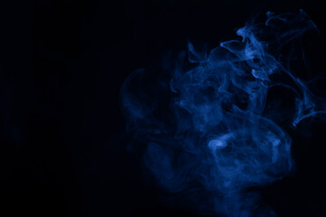 Blue and pink steam on a black background.