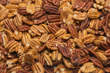 Tasty pecan-nut background. Top view.