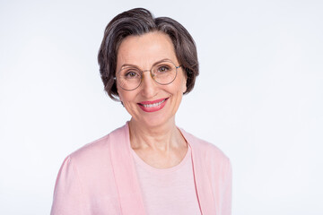 Photo of funny shiny mature lady wear pink clothes glasses smiling isolated white color background