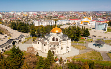 Obraz premium View from drone of modern landscape of Georgian port city of Poti overlooking residential areas and Orthodox Cathedral in Neo-Byzantine style on sunny spring day, Samegrelo-Zemo Svaneti region