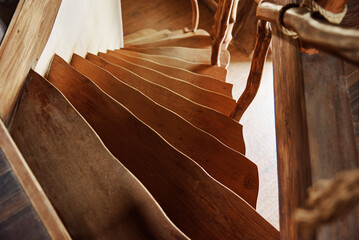 Fototapeta na wymiar Old wooden staircase with railings