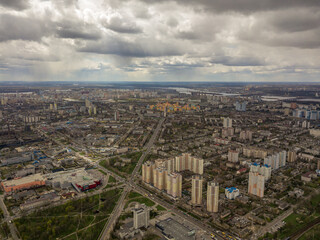 Fototapeta premium The city of Kiev in cloudy weather. Aerial high view.