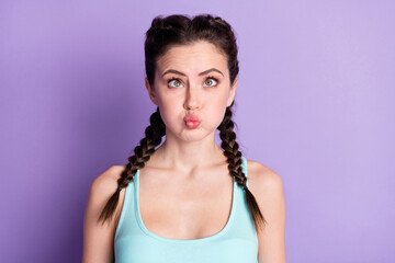 Portrait of funky brown hair lady hold air wear blue top isolated on pastel purple color background