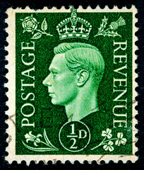 Postage stamp printed in the United Kingdom with a portrait of king George the Sixth