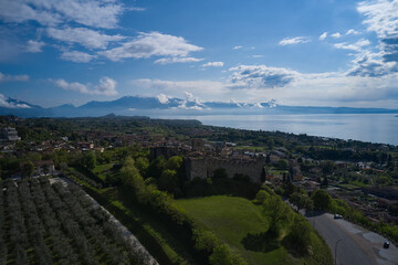 Aerial view of the historic part of Padenghe Castle on Lake Garda, Italy. Panorama of Lake Garda. Historic castles in Italy. Top view of the castle.