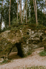The Devil's Oven. The only natural sandstone with arches in Latvia in Liepa parish. Vintage filter.