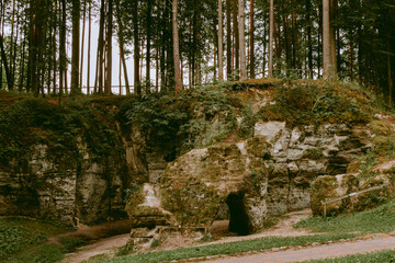 The Devil's Oven. The only natural sandstone with arches in Latvia in Liepa parish. Vintage filter.
