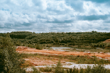 Lode clay quarry during sunny day. Feeling of a different planet - Mars