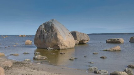The huge rock on the seashore in Lahemaa National Park on a fine sunny day in Estonia