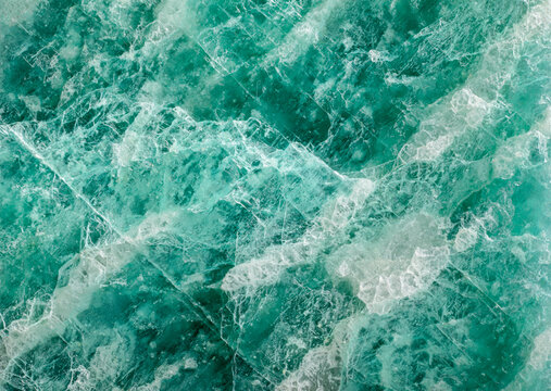 Mineral amazonite. A structure of a rock on fracture close-up