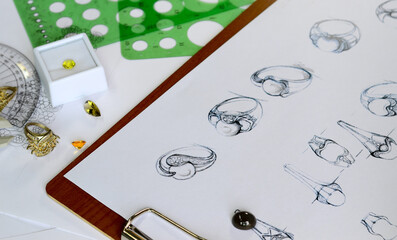 The sketch is designing jewelry rings.