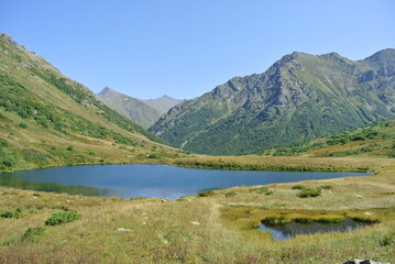 Naklejka na ściany i meble Trekking in the mountains of the North Caucasus. Aibga ridge