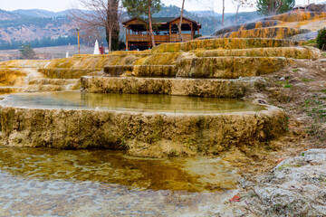 Fototapeta na wymiar Red thermal springs in the village of Karahayit, located near Pamukkale, Turkey.