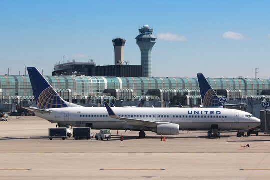 CHICAGO, UNITED STATES - APRIL 15, 2014: United Airlines Boeing 737 NG at O'Hare Airport in Chicago. It was the 5th busiest airport in the world with 66,883,271 passengers in 2013.