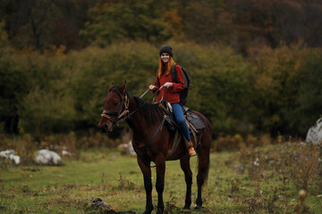 Woman riding horse outdoors fresh air travel landscape