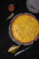 Food photo. Pear pie on black background. Beautiful food composition. Photo for recipe book.
