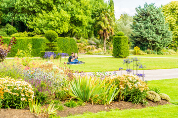 July 2020. London. People relaxing in Regents park in London, England, UK
