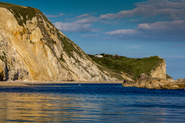 Fototapeta na wymiar white cliffs on dorset beach lulworth curve