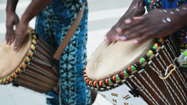 African American man plays the hand drum