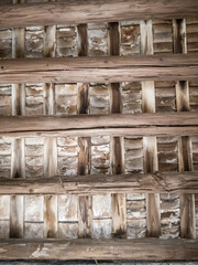 Water damaged wooden ceiling in an ancient Chinese shrine