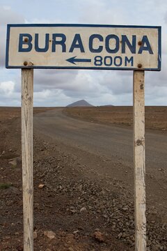 Cape Verde, Sal Island. A 263-meter-high Monte Leste is set between Buracona and Espargos. Indicator of direction to Buracon, a tourist attraction. Swimming lagoons and Magic eye.